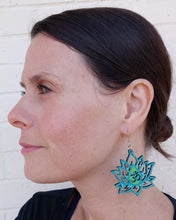 Load image into Gallery viewer, Hand Painted Green and Blue Om Symbol Lotus Flower Earrings
